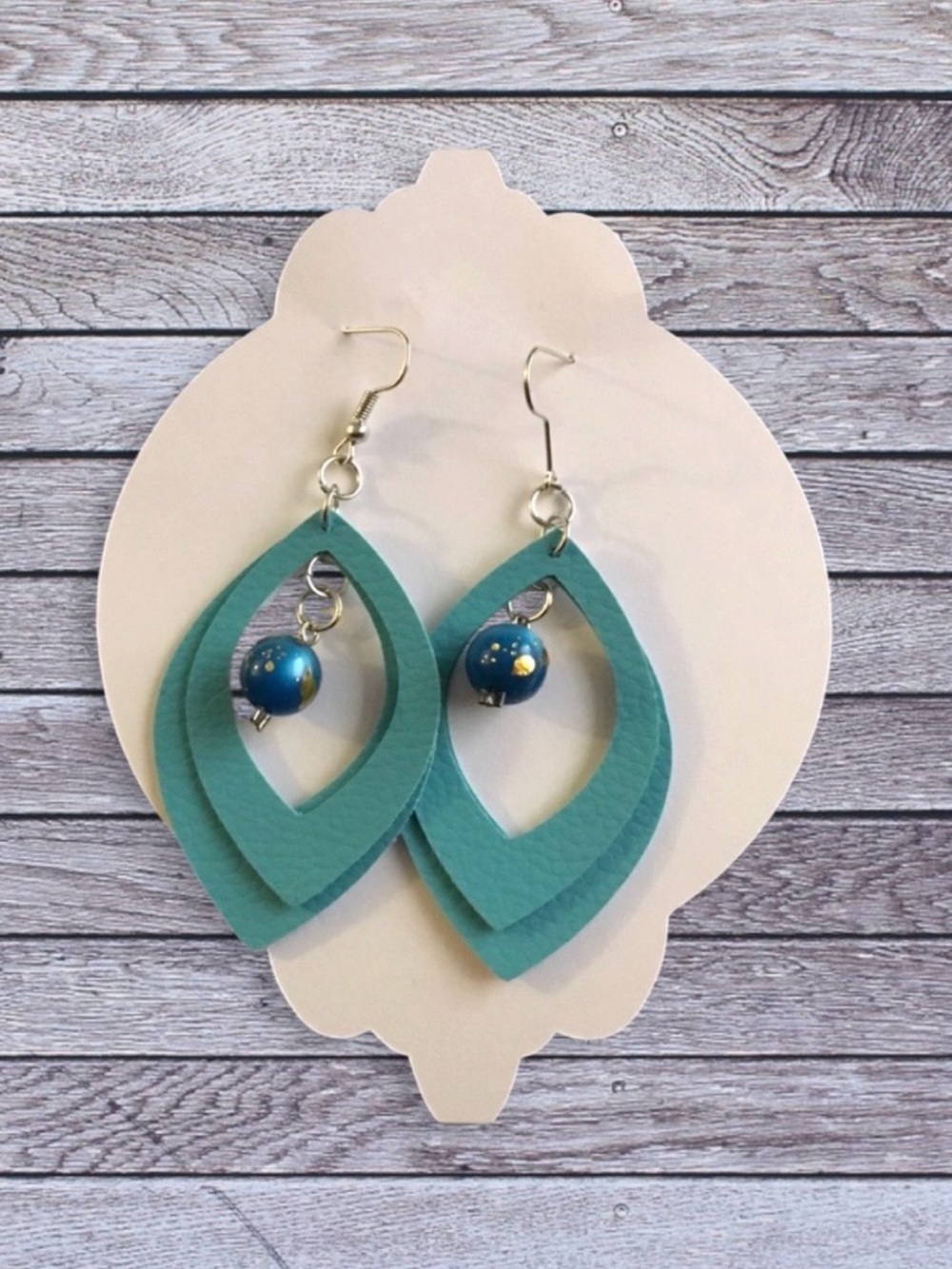 NEW Faux leather teal earrings with charm